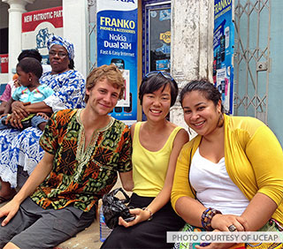 Three students studying abroad.